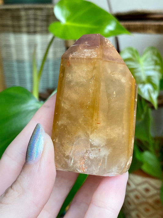 Dreamcoat Lemurian Generator - Polished Brazilian Tower Crystal from Curious Muse Crystals for 94.00. Tagged with clear brazil quartz, dreamcoat lemurian, goethite rutile, hematite amethyst, hide-notify-btn, lemurian, lemurian generator, lemurian seed, secondary growth, super seven, synergy seven