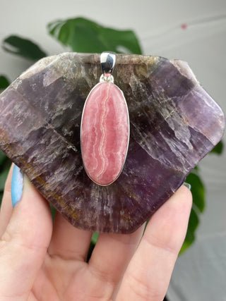 Rhodochrosite in Sterling Silver Pendant from Curious Muse Crystals for 94. Tagged with crystal energy, Crystal Jewelry, hide-notify-btn, pink, reiki healing, rhodochrosite, silver crystal jewel, sterling silver, witchy jewelry