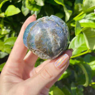 Grape Agate Sphere - Botryoidal Purple Chalcedony from Curious Muse Crystals for 132. Tagged with botyroidal, chalcedony, Crystal healing, genuine crystal, grape agate, hide-notify-btn, natural mineral, purple, raw mineral, reiki crystal, sphere