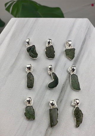 Moldavite in Sterling Silver Pendant - Genuine Tektite from Czech Republic from Curious Muse Crystals Tagged with clear, Crown crystal, crystal jewelry, genuine tektite, green, hide-notify-btn, moldavite, natural moldavite, sterling silver, tektite, Third eye stone, transformation