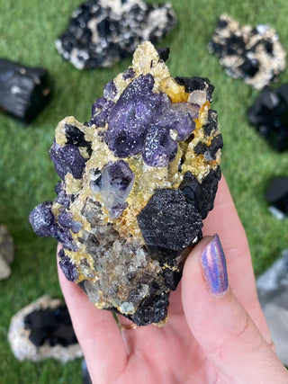 Erongo Fluorite with Tourmaline - High Grade from Curious Muse Crystals for 133. Tagged with black, erongo, fine mineral, fluorite, hide-notify-btn, namibia, purple, raw, tourmaline