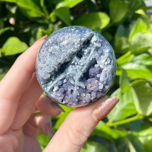 Grape Agate Sphere - Botryoidal Purple Chalcedony from Curious Muse Crystals for 98. Tagged with botyroidal, chalcedony, Crystal healing, genuine crystal, grape agate, hide-notify-btn, natural mineral, purple, raw mineral, reiki crystal, sphere