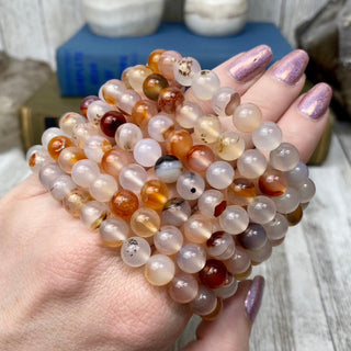 Dendritic Agate 8mm Round Bead Crystal Bracelet from Curious Muse Crystals for 7. Tagged with 8mm beads, agate, bracelet, clear, crystal jewelry, dendrite, dendritic agate, gemstone bead, gemstone jewelry, healing jewelry, orange, red