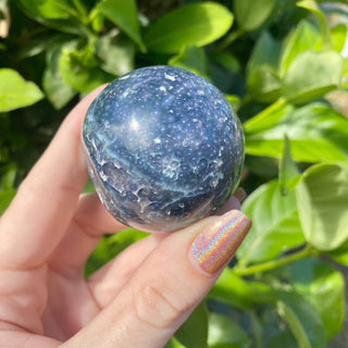 Grape Agate Sphere - Botryoidal Purple Chalcedony from Curious Muse Crystals Tagged with botyroidal, chalcedony, Crystal healing, genuine crystal, grape agate, hide-notify-btn, natural mineral, purple, raw mineral, reiki crystal, sphere