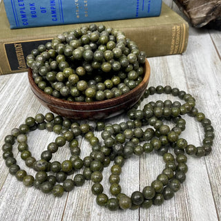 Epidote with Pyrite 8mm Round Bead Crystal Bracelet from Curious Muse Crystals for 7. Tagged with 8mm beads, bracelet, crystal jewelry, epidote, gemstone bead, gemstone jewelry, gold, green, healing jewelry, pyrite