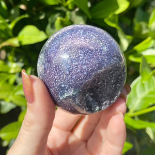 Grape Agate Sphere - Botryoidal Purple Chalcedony from Curious Muse Crystals for 122. Tagged with botyroidal, chalcedony, Crystal healing, genuine crystal, grape agate, hide-notify-btn, natural mineral, purple, raw mineral, reiki crystal, sphere
