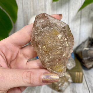 Double Terminated Fenster Quartz from Madagascar - Self-Discovery from Curious Muse Crystals for 145. Tagged with clear, crystal energy, Elestial Quartz, enhydro, fenster quartz, fluid inclusion, hide-notify-btn, inclusion quartz, limonite, mexico, quartz, reiki healing, yellow