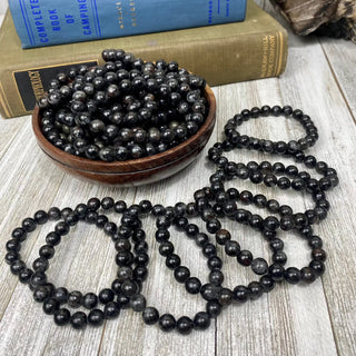 Astrophyllite 8mm Round Bead Crystal Bracelet from Curious Muse Crystals for 9. Tagged with 8mm beads, astrophyllite, black, bracelet, crystal jewelry, gemstone bead, gemstone jewelry, healing jewelry, silver