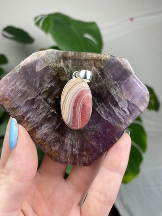 Rhodochrosite in Sterling Silver Pendant from Curious Muse Crystals Tagged with crystal energy, Crystal Jewelry, hide-notify-btn, pink, reiki healing, rhodochrosite, silver crystal jewel, sterling silver, witchy jewelry